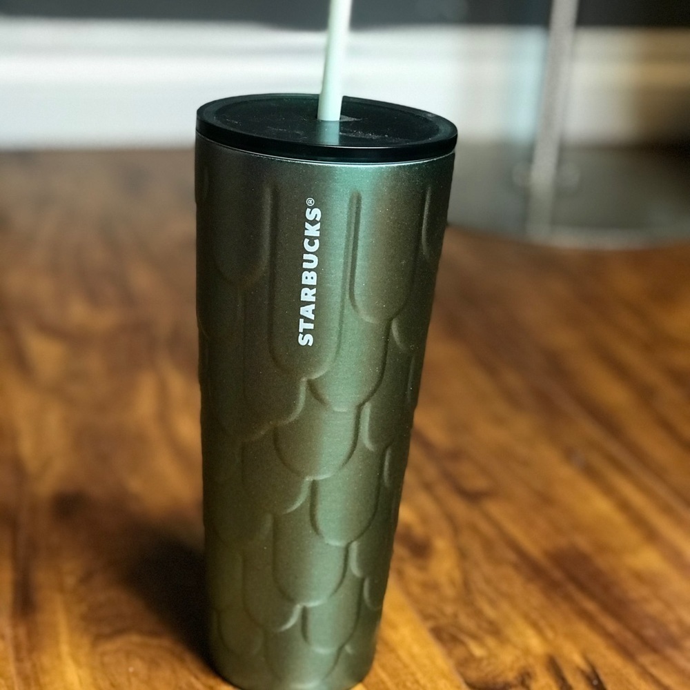 NWT collectible Starbucks green mermaid tail coffee cup with black lid and straw